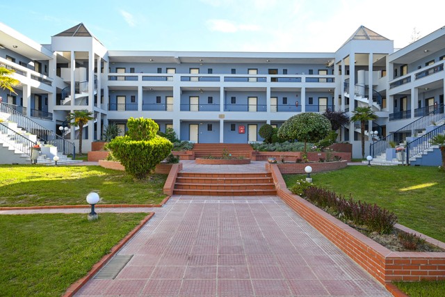 Garden path between hotel buildings