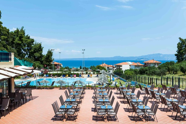 Pool bar tables overlooking the sea