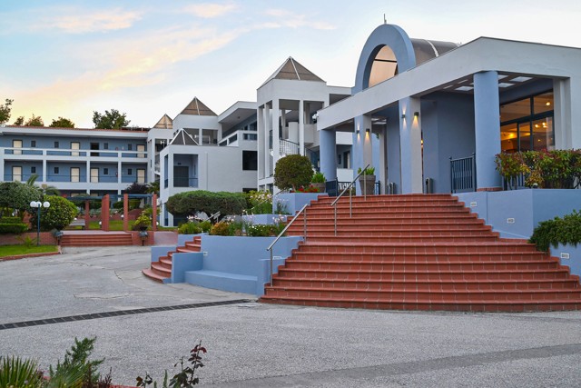 Front steps leading to the hotel entrance